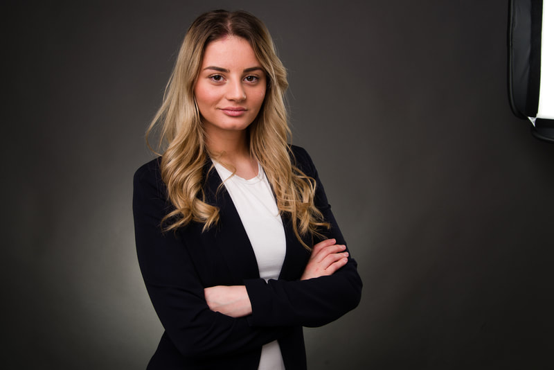 Corporate photo of a young blonde woman